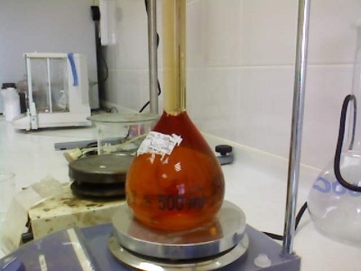 Rodium Cloride dissolving in 5 M HNO3